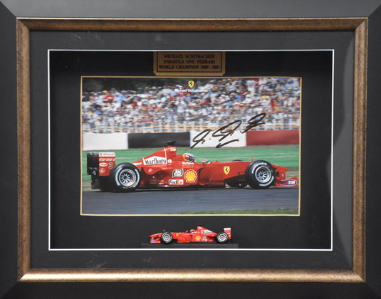 2000-2001 F1 Champion Personally Signed Michael Schumacher Collage, from Unique Memorabilia. 