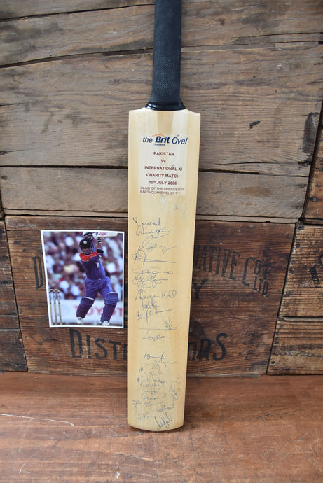 International XI v Pakistan Bat Personally Signed by both Teams, 2006