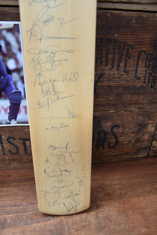 International XI v Pakistan Bat Personally Signed by both Teams, 2006