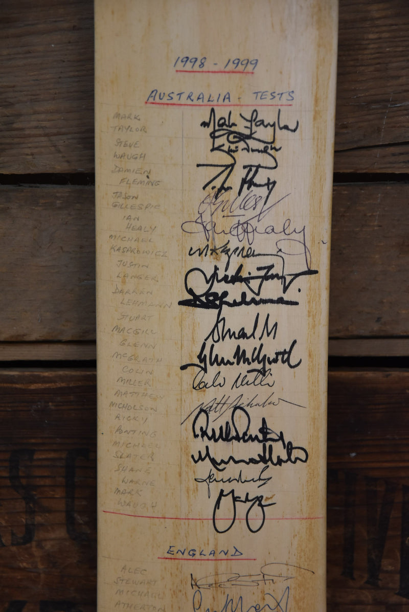 Load image into Gallery viewer, 1998-99 Team Signed Bat by Australia, England and Sri Lanka, from Unique Memorabilia. 
