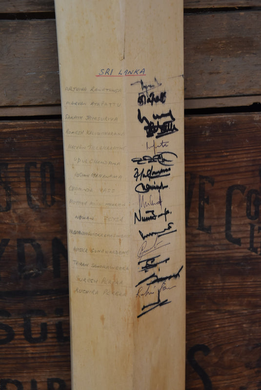 1998-99 Team Signed Bat by Australia, England and Sri Lanka, from Unique Memorabilia. 