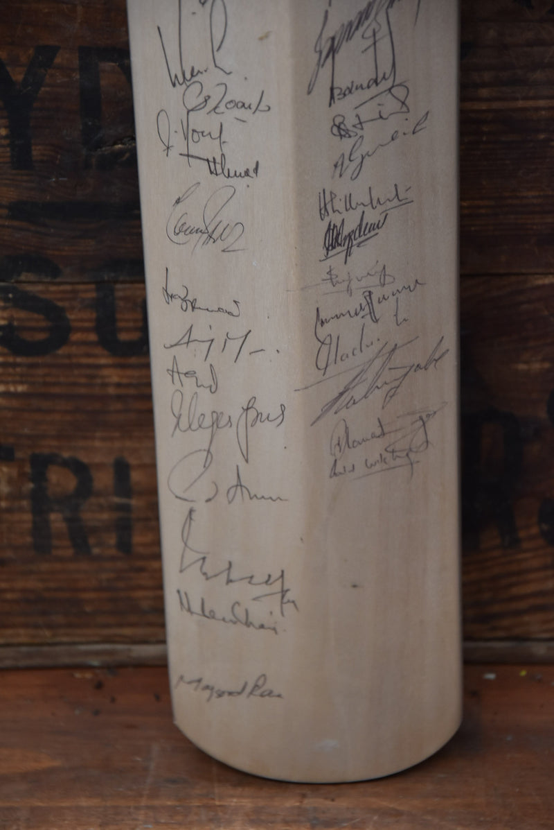Load image into Gallery viewer, 1989/90 Team Signed Bat by Australia, Pakistan and Sri Lanka, from Unique Memorabilia. 
