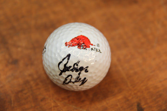 John Daly & Greg Norman - Tournament-Hit/Signed Golf Balls and Signed Photos