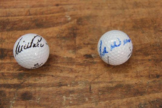John Daly & Greg Norman - Tournament-Hit/Signed Golf Balls and Signed Photos