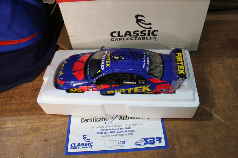 Load image into Gallery viewer, Marcos Ambrose Personally Signed Official Shirt + Signed 2003 BA Falcon 1:18
