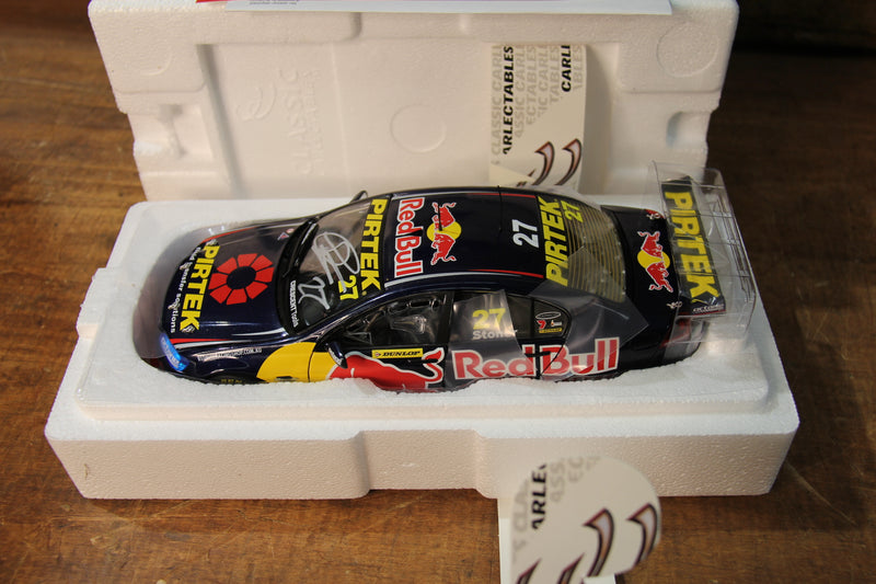 Load image into Gallery viewer, Casey Stoner Personally Signed 1:18 Holden VE Commodore + Signed Red Bull Cap
