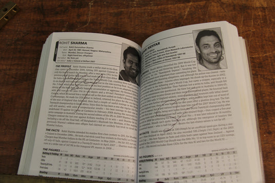ESPN CricInfo 2010 Guide Personally Signed by a Multitude of International Players