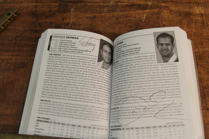 Load image into Gallery viewer, ESPN CricInfo 2010 Guide Personally Signed by a Multitude of International Players
