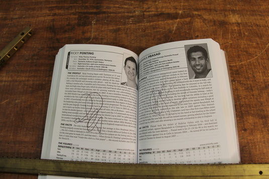 ESPN CricInfo 2010 Guide Personally Signed by a Multitude of International Players