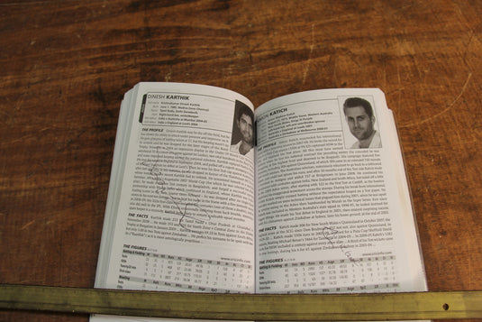 ESPN CricInfo 2010 Guide Personally Signed by a Multitude of International Players
