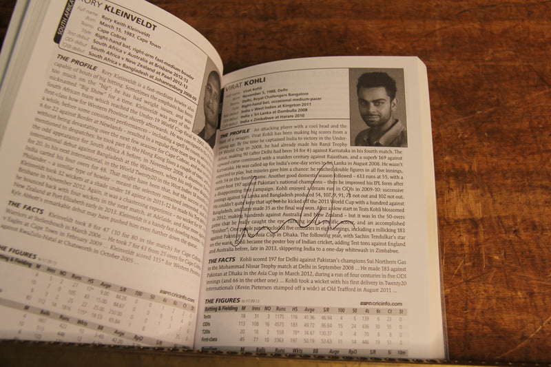 Load image into Gallery viewer, Wisden 2014 Cricket Guide Personally Signed by a Multitude of International Players
