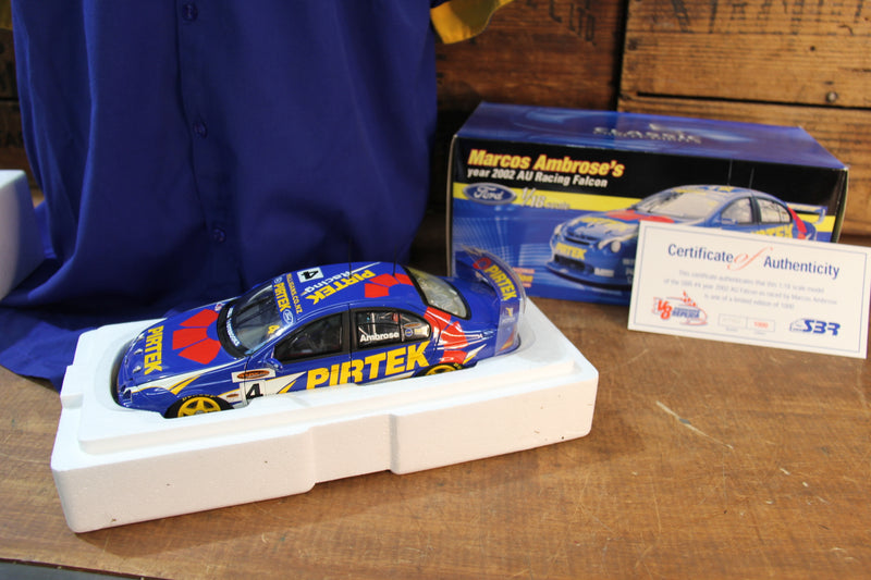 Load image into Gallery viewer, Marcos Ambrose Personally Signed Official Shirt + 2002 AU Falcon 1:18
