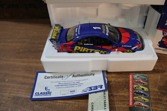 Marcos Ambrose Personally Signed Official 2004 Cap + 2004 BA Falcon 1:18