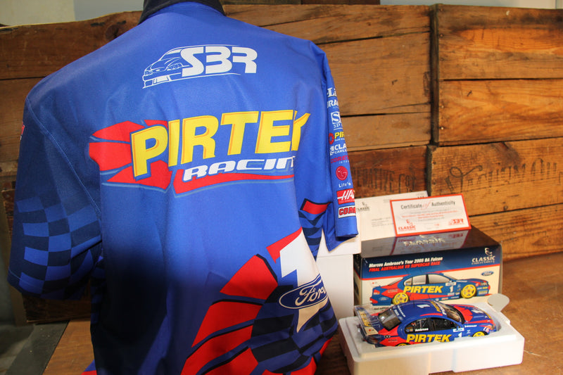 Load image into Gallery viewer, Marcos Ambrose Personally Signed Official Shirt + 2005 BA Falcon 1:18
