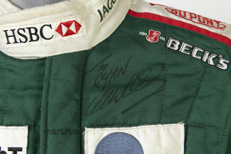Load image into Gallery viewer, Mark Webber Formula 1 Worn Race Suit from Unique Memorabilia
